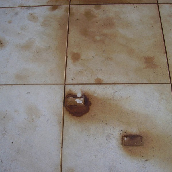 rust marks on tiles, rust on tiles, rust on stone